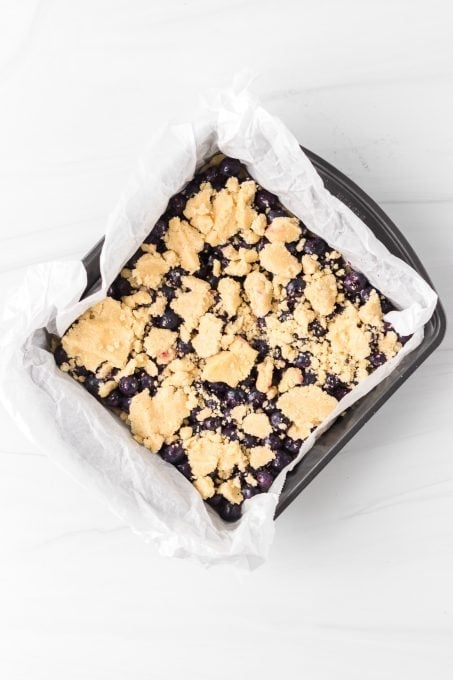Bars with fresh blueberries ready for the oven.