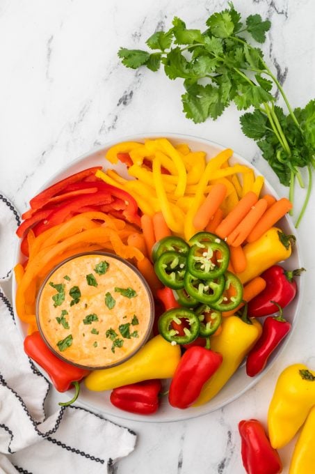 Vegetables and spicy cheese dip made with cottage cheese and taco seasoning.