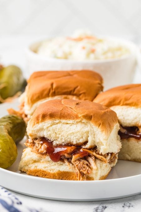 Sliders with chicken and BBQ sauce.