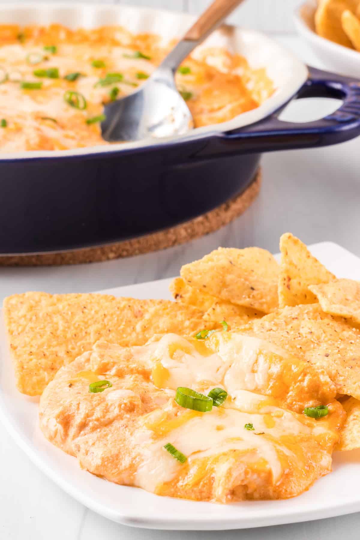 A chicken dip with buffalo sauce and cottage cheese.