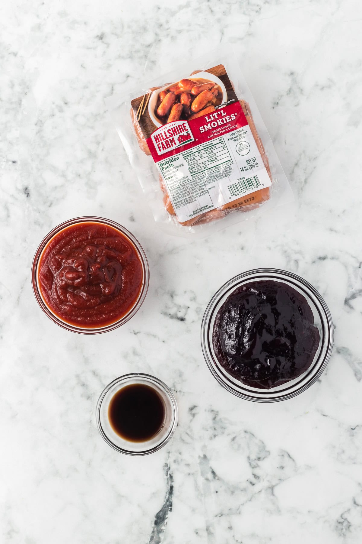 Smoked sausages, chili sauce, grape jam and Worcestershire sauce.