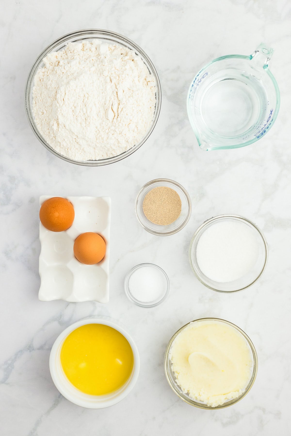 Ingredients to make a loaf of bread made with mashed potatoes.