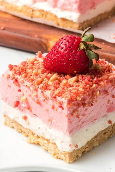 A Strawberry Shortcake Bar with a strawberry on top.