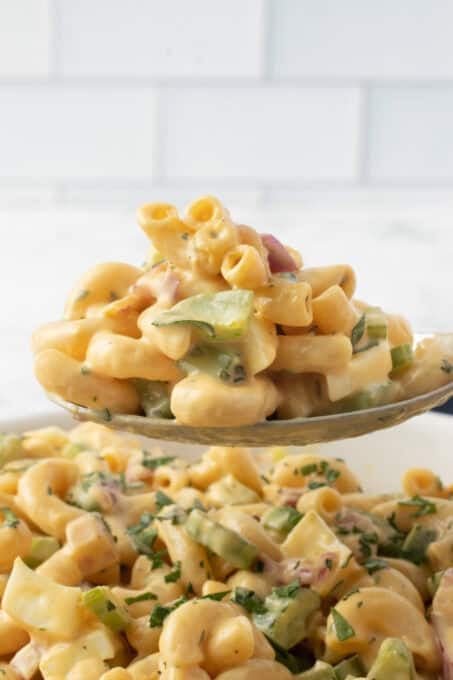 A bite of a pasta salad made with Chick-fil-A sauce.
