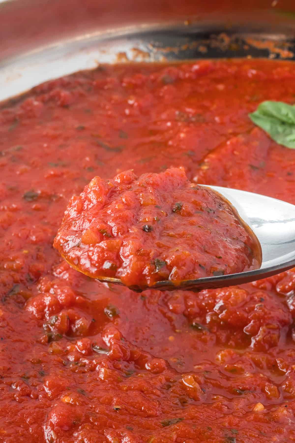 A spoonful of homemade red gravy.