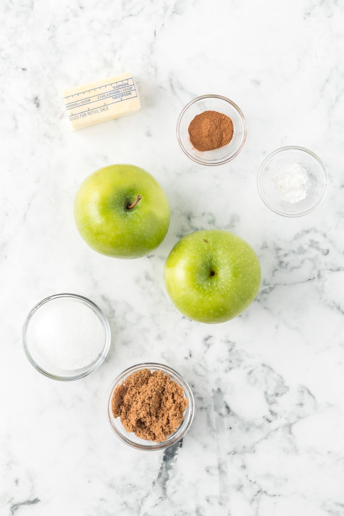 Ingredients for a fried apple dessert recipe.